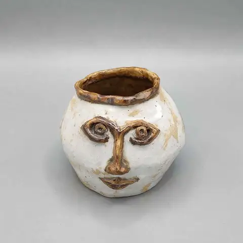 White face pot with amber linework