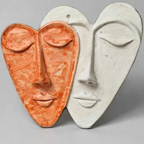Two-tone heart face plaque, orange and white