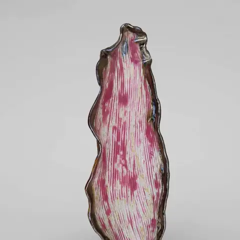 Tall leaf-shaped dish with magenta combed glaze