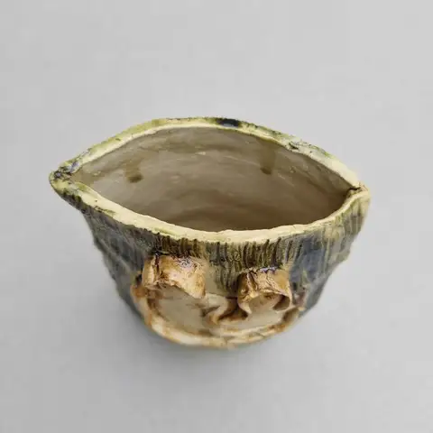 Textured pinch bowl with knot details