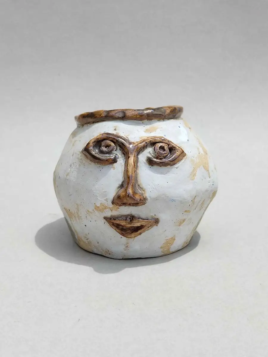 Bronze-Lined Face Pot, sculpted face pot