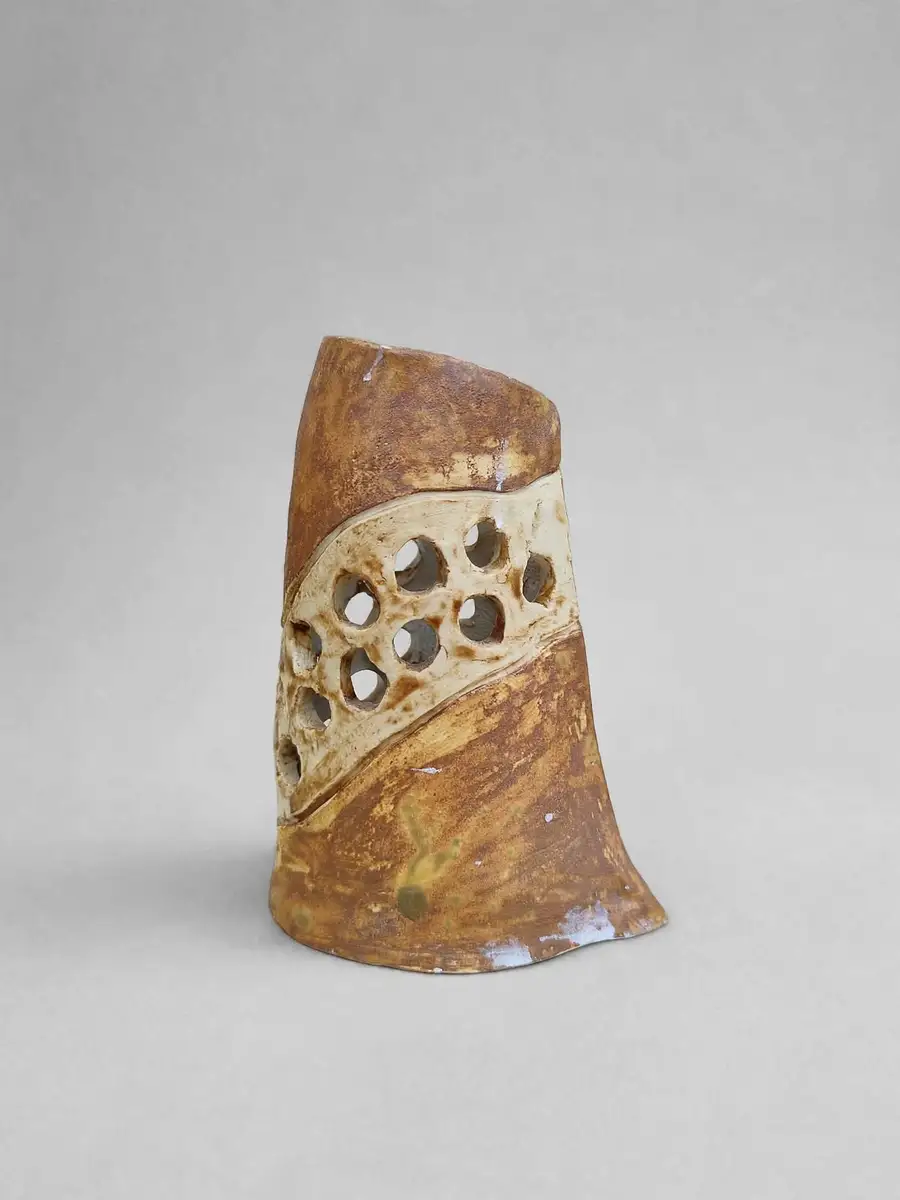 Rust Lattice Vessel, tall perforated vessel